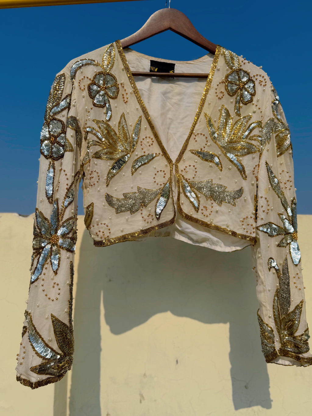 Cream and gold embellished jacket