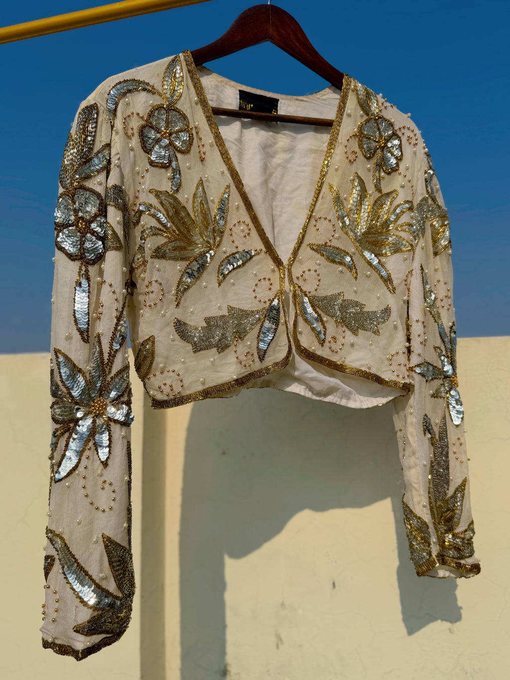 Cream and gold embellished jacket