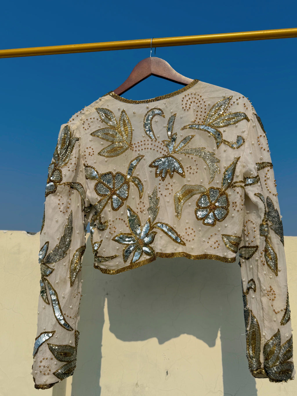 Cream and gold embellished jacket