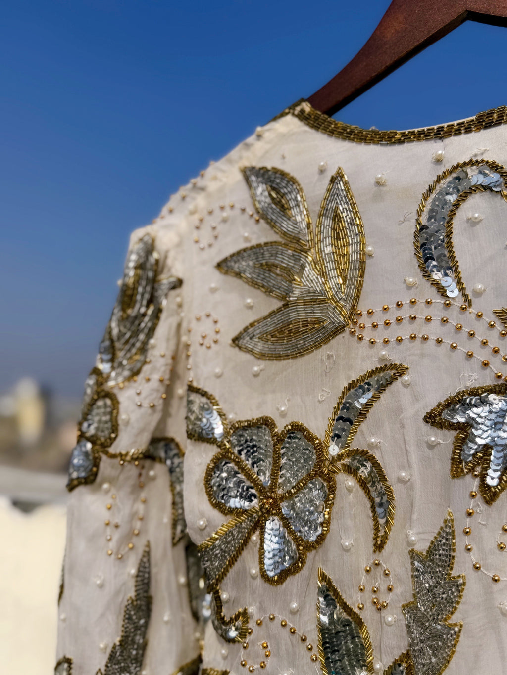 Cream and gold embellished jacket